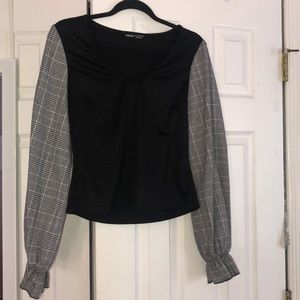 Black blouse with plaid sleeves